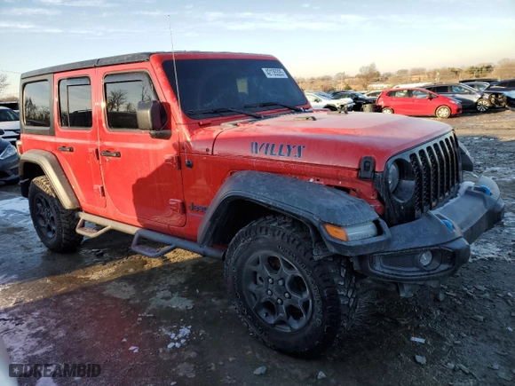2023 Jeep Wrangler 4xe with VIN 1C4JJXN68PW684729, listed as a Copart auction lot 42135335 with 52,811 mi miles and Salvage Title. Bid and sale history available at carsss.com. Image 4.