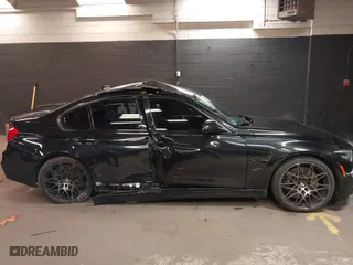 2018 BMW M3 with VIN WBS8M9C5XJ5L71599, listed as a IAAI auction lot 41932825 with 53,730 mi miles. Bid and sale history available at carsss.com. Image 13.