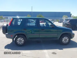 2000 Honda CR-V LX z VIN JHLRD2849YC011915, wystawiony jako IAAI lot #42040519 z przebiegiem 160 919 mil mil oraz . Historia ofert i sprzedaży dostępna na DreamBid. Obrazek 13.