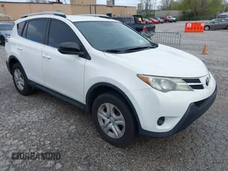 2014 Toyota RAV4 LE with VIN JTMBFREV2EJ006965, listed as a IAAI auction lot 41961470 with 194,881 mi miles and . Bid and sale history available at DreamBid. Image 1.