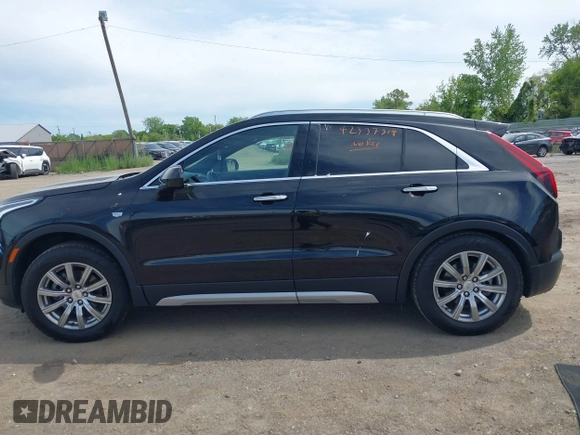 2020 Cadillac XT4 AWD Premium Luxury with VIN 1GYFZDR4XLF081159, listed as a IAAI auction lot 42337319 with 49,234 mi miles and . Bid and sale history available at DreamBid. Image 14.