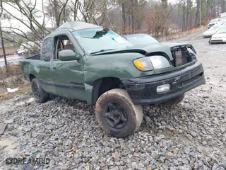 2002 Toyota Tundra SR5 with VIN 5TBRT34122S326071, listed as a IAAI auction lot 41537852 with 218,561 mi miles. Bid and sale history available at carsss.com. Image 1.