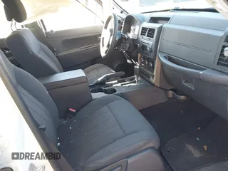 2012 Jeep Liberty Sport with VIN 1C4PJLAK7CW213834, listed as a IAAI auction lot 41353723 with 220,371 mi miles and . Bid and sale history available at DreamBid. Image 5.