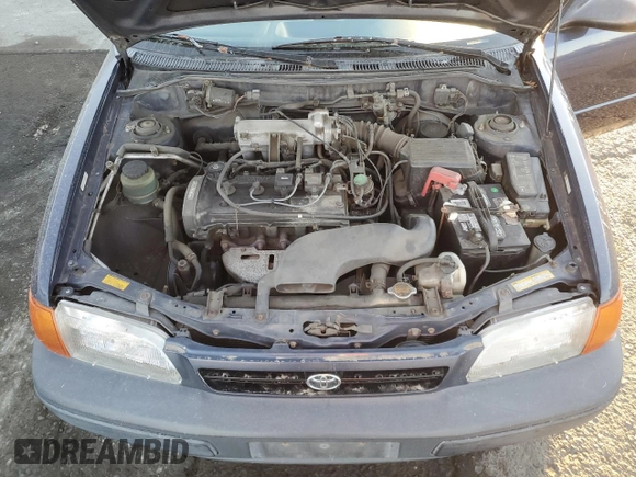 1996 Toyota Tercel DX z VIN JT2AC52L5T0190097, wystawiony jako Copart lot #76574844 z przebiegiem 175 256 mil mil oraz Tytuł czysty. Historia ofert i sprzedaży dostępna na DreamBid. Obrazek 11.