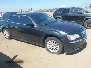 2013 Chrysler 300 with VIN 2C3CCAAG4DH519502, listed as a IAAI auction lot 42533689 with 128,551 mi miles and . Bid and sale history available at DreamBid. Image 1.
