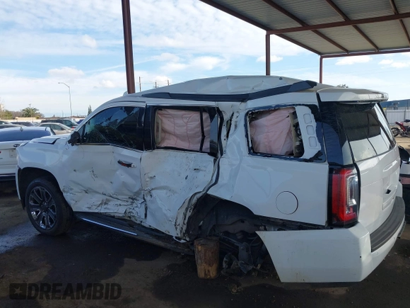 2019 GMC Yukon SLT with VIN 1GKS2BKC5KR109529, listed as a IAAI auction lot 41559860 with 136,025 mi miles. Bid and sale history available at carsss.com. Image 15.