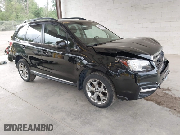2018 Subaru Forester Touring with VIN JF2SJAWC2JH598982, listed as a IAAI auction lot 42455652 with 57,254 mi miles and . Bid and sale history available at DreamBid. Image 1.