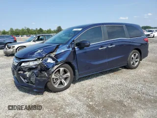 2020 Honda Odyssey Touring with VIN 5FNRL6H85LB003302, listed as a Copart auction lot 72709924 with 58,228 mi miles and Salvage Title. Bid and sale history available at DreamBid. Image 1.