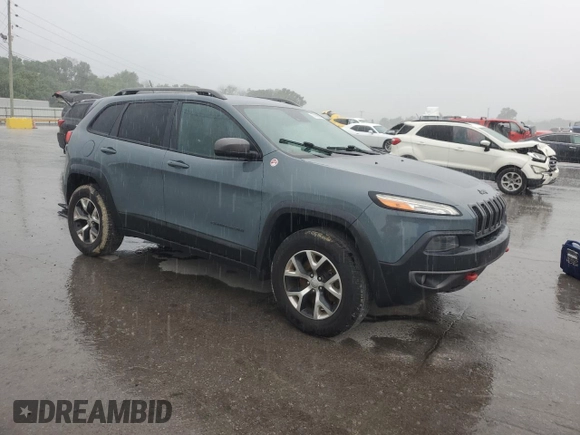 2014 Jeep Cherokee Trailhawk z VIN 1C4PJMBS7EW236960, wystawiony jako Copart lot #57098695 z przebiegiem 159 065 mil mil oraz Czysty tytuł • Clean title. Historia ofert i sprzedaży dostępna na DreamBid. Obrazek 4.
