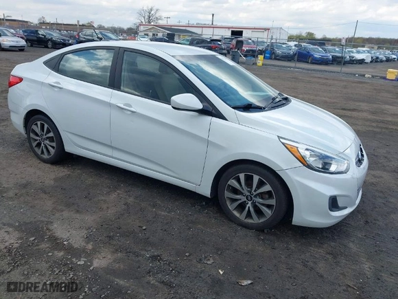 2017 Hyundai Accent SE with VIN KMHCT4AEXHU361631, listed as a IAAI auction lot 42037045 with 136,847 mi miles. Bid and sale history available at carsss.com. Image 1.