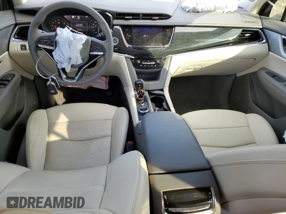 2021 Cadillac XT6 Premium Luxury z VIN 1GYKPCRS6MZ205831, wystawiony jako Copart lot #47259215 z przebiegiem 31 959 mil mil oraz Szkody całkowita. Historia ofert i sprzedaży dostępna na DreamBid. Obrazek 8.