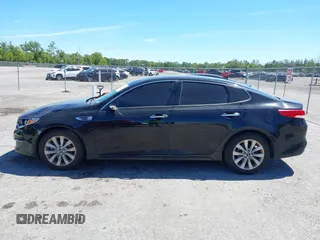 2017 Kia Optima EX with VIN 5XXGU4L35HG142807, listed as a IAAI auction lot 41856251 with 104,634 mi miles and . Bid and sale history available at carsss.com. Image 14.