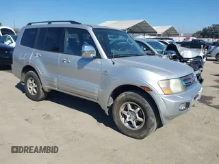 2001 Mitsubishi Montero Limited z VIN JA4MW51R91J030890, wystawiony jako IAAI lot #41665898 z przebiegiem 177 106 mil mil oraz . Historia ofert i sprzedaży dostępna na DreamBid. Obrazek 1.