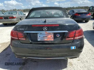 2015 Mercedes-Benz E 400 with VIN WDDKK6FFXFF301128, listed as a Copart auction lot 76691954 with 49,313 mi miles and Salvage title. Bid and sale history available at DreamBid. Image 6.