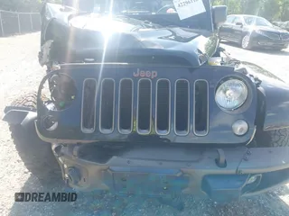 2016 Jeep Wrangler Unlimited Sahara with VIN 1C4BJWEG8GL253803, listed as a IAAI auction lot 42296118 with 163,463 mi miles and . Bid and sale history available at DreamBid. Image 17.