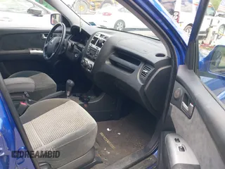 2005 Kia Sportage LX z VIN KNDJE723657074723, wystawiony jako IAAI lot #42372967 z przebiegiem 105 934 mil mil oraz . Historia ofert i sprzedaży dostępna na DreamBid. Obrazek 5.