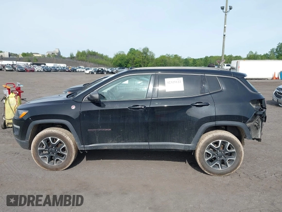 2020 Jeep Compass Trailhawk z VIN 3C4NJDDB7LT195317, wystawiony jako IAAI lot #42325122 z przebiegiem 97 858 mil mil oraz . Historia ofert i sprzedaży dostępna na DreamBid. Obrazek 14.