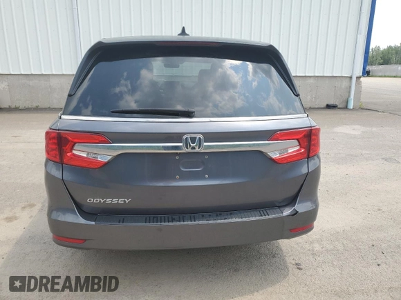 2018 Honda Odyssey with VIN 5FNRL6H49JB504977, listed as a Copart auction lot 60905615 with 180,464 mi miles and Clean title. Bid and sale history available at DreamBid. Image 6.