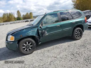 2005 GMC Envoy SLT with VIN 1GKDT13S952144349, listed as a Copart auction lot 71800694 with 137,614 mi miles and Salvage Title. Bid and sale history available at DreamBid. Image 1.
