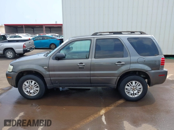 2006 Mercury Mariner Luxury with VIN 4M2YU57166KJ17723, listed as a IAAI auction lot 41818695 with 136,881 mi miles and . Bid and sale history available at DreamBid. Image 14.