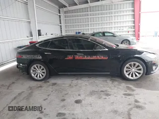 2017 Tesla Model S 60 z VIN 5YJSA1E17HF179051, wystawiony jako IAAI lot #42430013 z przebiegiem 201 174 mil mil oraz . Historia ofert i sprzedaży dostępna na DreamBid. Obrazek 14.