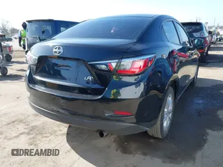 2016 Scion iA z VIN 3MYDLBZV4GY140248, wystawiony jako IAAI lot #42282531 z przebiegiem 72 644 mil mil oraz . Historia ofert i sprzedaży dostępna na DreamBid. Obrazek 4.