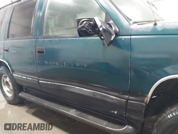 1996 Chevrolet Tahoe z VIN 1GNEK13R4TJ417000, wystawiony jako IAAI lot #41992121 z przebiegiem 166 215 mil mil oraz . Historia ofert i sprzedaży dostępna na DreamBid. Obrazek 6.