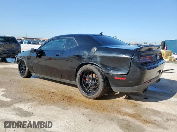 2015 Dodge Challenger SXT Plus z VIN 2C3CDZBG2FH723521, wystawiony jako Copart lot #52642195 z przebiegiem 145 834 mil mil oraz Szkoda całkowita • Salvage title. Historia ofert i sprzedaży dostępna na DreamBid. Obrazek 2.