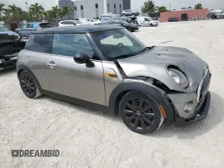2018 MINI Hardtop Cooper with VIN WMWXP5C56J2H29012, listed as a Copart auction lot 50571595 with 77,129 mi miles and Salvage title. Bid and sale history available at DreamBid. Image 4.