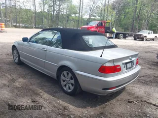 2006 BMW 3 Series 325Ci with VIN WBABW33466PX87945, listed as a IAAI auction lot 42019374 with 154,171 mi miles. Bid and sale history available at carsss.com. Image 3.