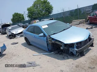 2012 Toyota Camry XLE z VIN 4T1BD1FK7CU048776, wystawiony jako IAAI lot #42414178 z przebiegiem Nie podano mil oraz . Historia ofert i sprzedaży dostępna na DreamBid. Obrazek 1.
