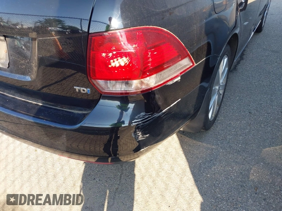 2013 Volkswagen Jetta TDI w/Sunroof & Nav with VIN 3VWPL7AJ8DM689372, listed as a IAAI auction lot 42562342 with 245,673 mi miles and . Bid and sale history available at DreamBid. Image 6.