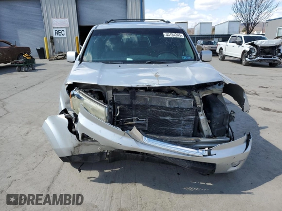 2009 Honda Pilot EX-L with VIN 5FNYF48559B020820, listed as a Copart auction lot 50194345 with 0 mi miles and Salvage Title. Bid and sale history available at carsss.com. Image 5.