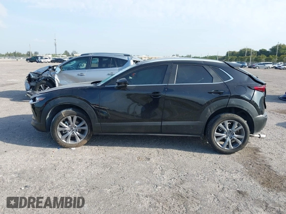 2024 Mazda CX-30 S Preferred with VIN 3MVDMBCM0RM669099, listed as a IAAI auction lot 41864473 with 6,278 mi miles and . Bid and sale history available at DreamBid. Image 14.