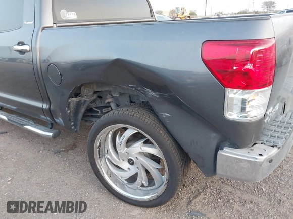2013 Toyota Tundra Limited with VIN 5TFFY5F19DX137337, listed as a IAAI auction lot 41848771 with 182,886 mi miles and . Bid and sale history available at DreamBid. Image 6.