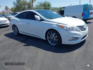 2014 Hyundai Azera Limited with VIN KMHFH4JG2EA333397, listed as a IAAI auction lot 42610633 with 128,952 mi miles and . Bid and sale history available at DreamBid. Image 1.