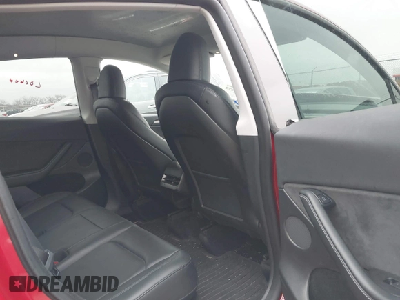 2023 Tesla Model Y Long Range with VIN 7SAYGDEE6PA027497, listed as a IAAI auction lot 41491072 with 24,962 mi miles and . Bid and sale history available at DreamBid. Image 8.