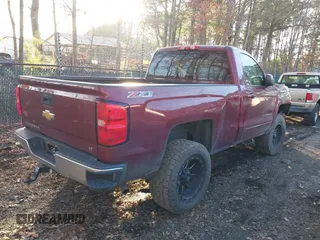 2015 Chevrolet Silverado 1500 LT with VIN 1GCNKREC3FZ233348, listed as a IAAI auction lot 41496887 with 253,994 mi miles. Bid and sale history available at carsss.com. Image 4.