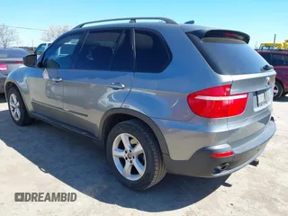 2008 BMW X5 3.0si with VIN 5UXFE43598L022453, listed as a IAAI auction lot 41852297 with 185,528 mi miles. Bid and sale history available at carsss.com. Image 3.