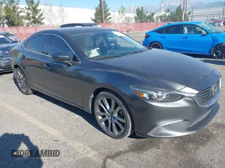 2017 Mazda 6 Grand Touring with VIN JM1GL1W51H1137470, listed as a IAAI auction lot 41872756 with 132,564 mi miles. Bid and sale history available at carsss.com. Image 1.