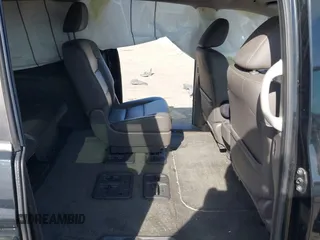 2015 Honda Odyssey EX-L with VIN 5FNRL5H65FB088106, listed as a IAAI auction lot 41880915 with 176,539 mi miles and . Bid and sale history available at carsss.com. Image 8.