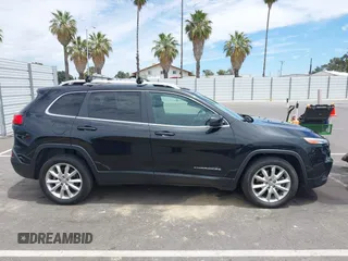2014 Jeep Cherokee Limited z VIN 1C4PJLDB9EW162416, wystawiony jako IAAI lot #42779797 z przebiegiem 158 581 mil mil oraz . Historia ofert i sprzedaży dostępna na DreamBid. Obrazek 13.