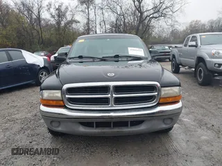 2000 Dodge Dakota with VIN 1B7GL22X6YS703226, listed as a IAAI auction lot 40849454 with 105,990 mi miles. Bid and sale history available at carsss.com. Image 12.