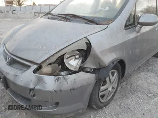 2007 Honda Fit with VIN JHMGD38417S043657, listed as a IAAI auction lot 41025258 with 147,034 mi miles. Bid and sale history available at carsss.com. Image 6.