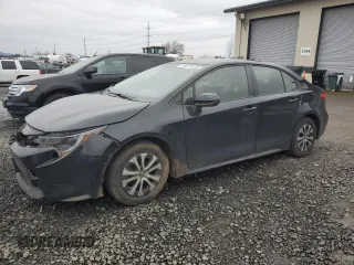2022 Toyota Corolla Hybrid LE with VIN JTDEAMDE6NJ048572, listed as a Copart auction lot 45695785 with 60,073 mi miles and Salvage Title. Bid and sale history available at carsss.com. Image 1.