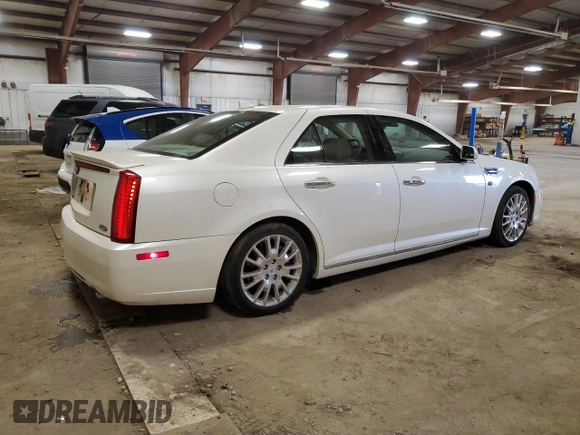 2010 Cadillac STS AWD z VIN 1G6DU6EV0A0106434, wystawiony jako Copart lot #52439915 z przebiegiem 90 187 mil mil oraz Czysty tytuł • Clean title. Historia ofert i sprzedaży dostępna na DreamBid. Obrazek 3.