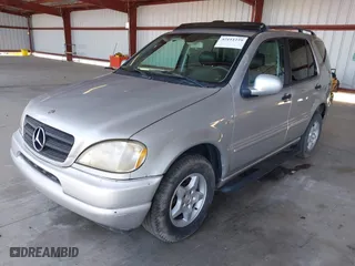 2001 Mercedes-Benz M-Class with VIN 4JGAB54E21A250865, listed as a IAAI auction lot 42111259 with 261,546 mi miles. Bid and sale history available at carsss.com. Image 2.