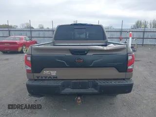 2021 Nissan Titan SL z VIN 1N6AA1ED6MN526285, wystawiony jako IAAI lot #41866324 z przebiegiem 80 524 mil mil oraz . Historia ofert i sprzedaży dostępna na DreamBid. Obrazek 16.