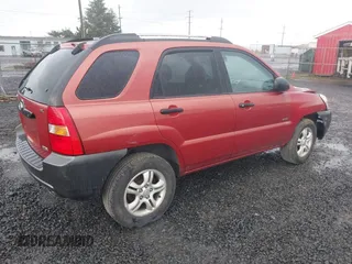 2006 Kia Sportage LX with VIN KNDJE723167159809, listed as a IAAI auction lot 41974464 with 130,822 mi miles and . Bid and sale history available at DreamBid. Image 4.