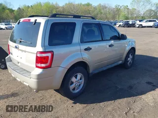 2010 Ford Escape XLT with VIN 1FMCU9D75AKB64794, listed as a IAAI auction lot 42141609 with 118,791 mi miles. Bid and sale history available at carsss.com. Image 4.